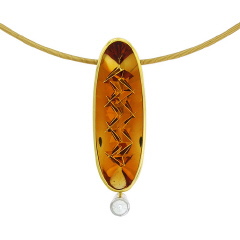 A 20.91 carat citrine pendant sculpted in a crisscross manner by Tom Munsteiner (Aaron Faber Gallery, NYC)