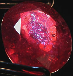 Surface crazing, cracks and bubbles in a composite ruby