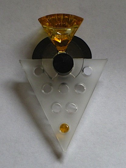 Pendant of citrine, onyx, quartz, and Mexican opal carved and assembled by Trent Mann