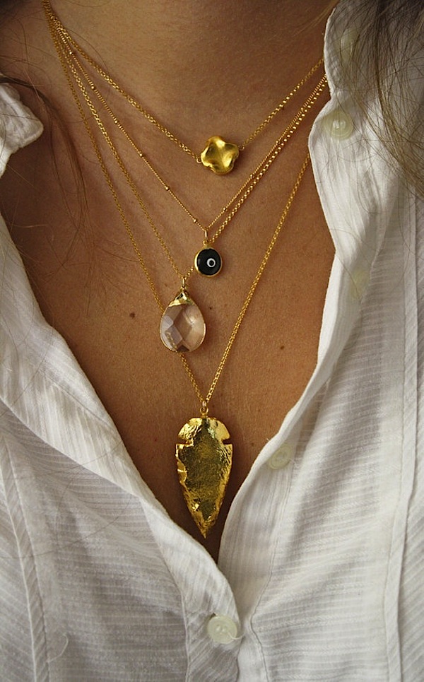 Layered necklaces, including 24k arrowhead from shopkei on Etsy