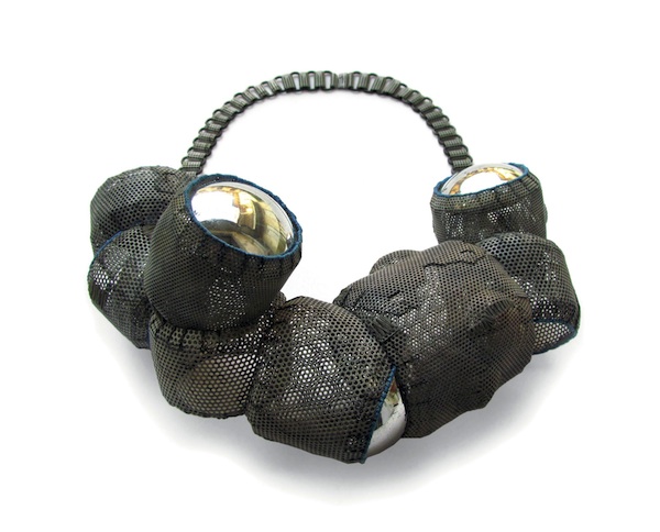 Neckpiece from "My Four Guardian Angles - Blue Series," 2012, of iron mesh, mirrored plastic, threads, reflective light threads, paint, and lacquer