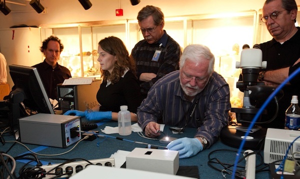 John Hatleberg (left) and the president of Graff Diamonds watch as curator Jeffrey Post tests the Wittelsbach Diamond in 2010.