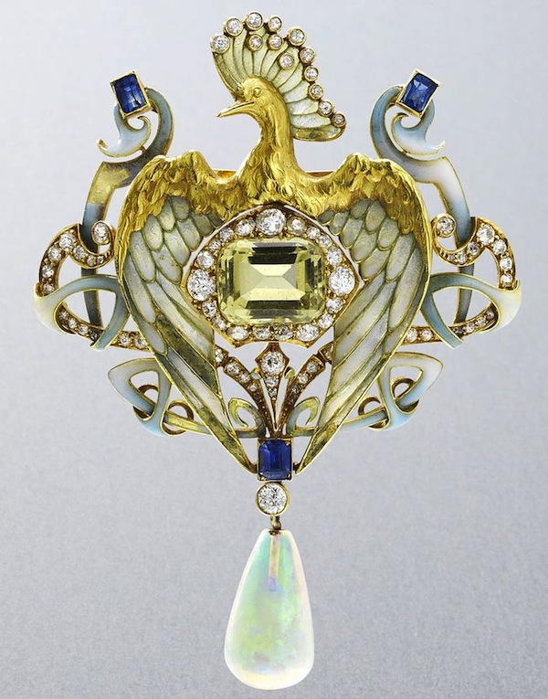 An art nouveau enamel, peridot and diamond brooch/pendant with opal drop, by Philippe Wolfers, circa 1902 , sold for $34,596 at Bonhams, London, in 2012